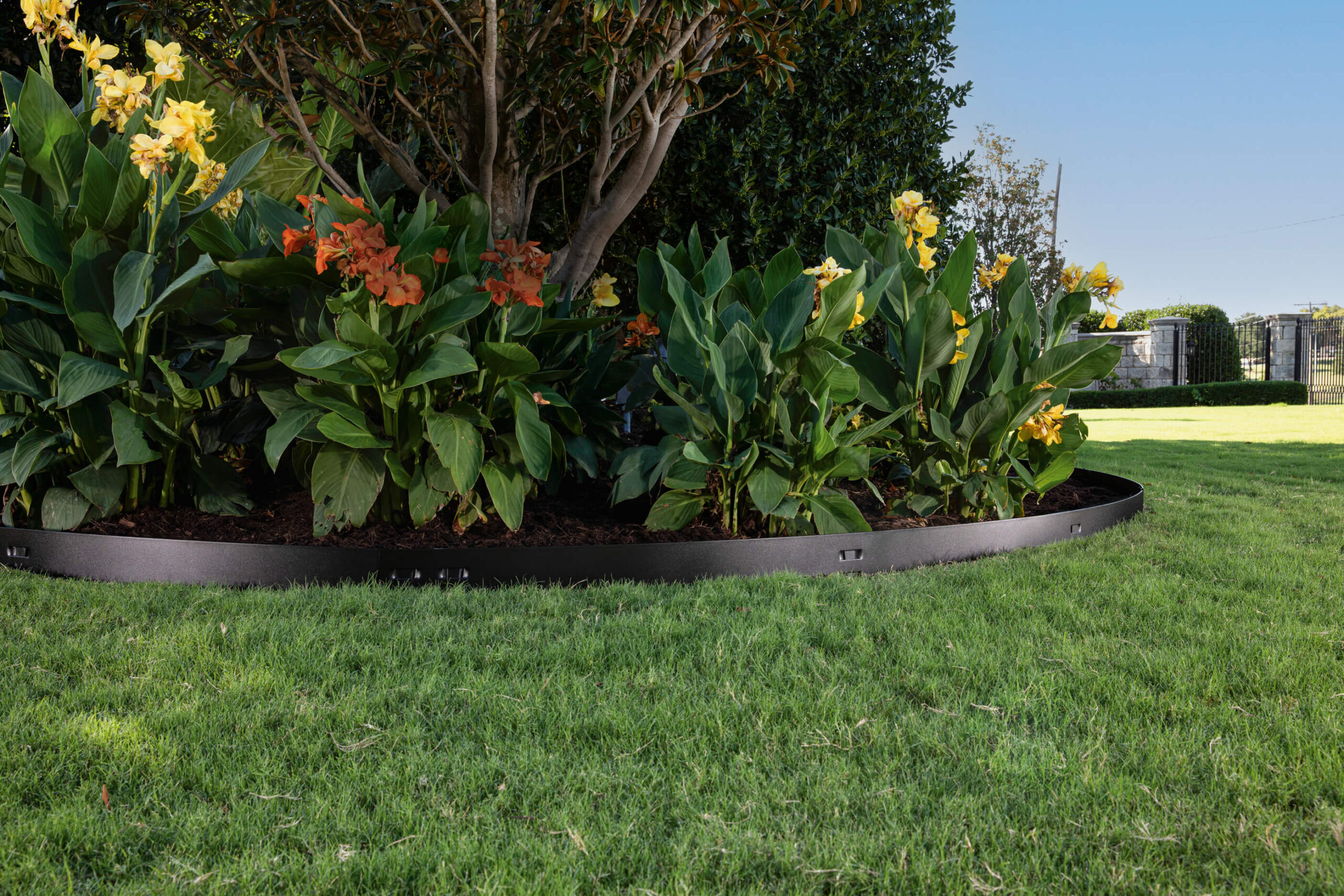 Classic Steel Edging between a flower garden and grass